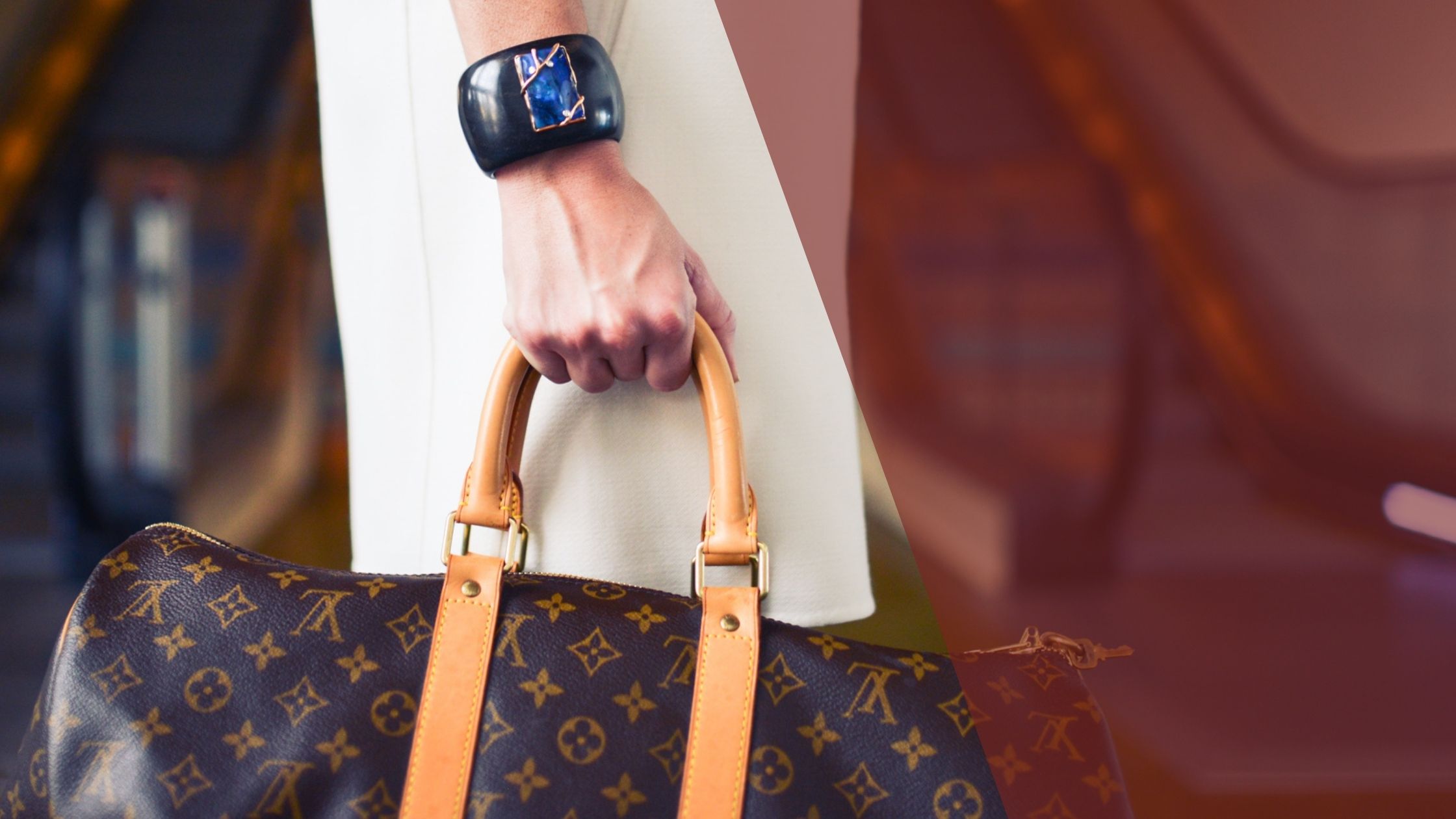 Woman carrying a Louis Vuitton bag