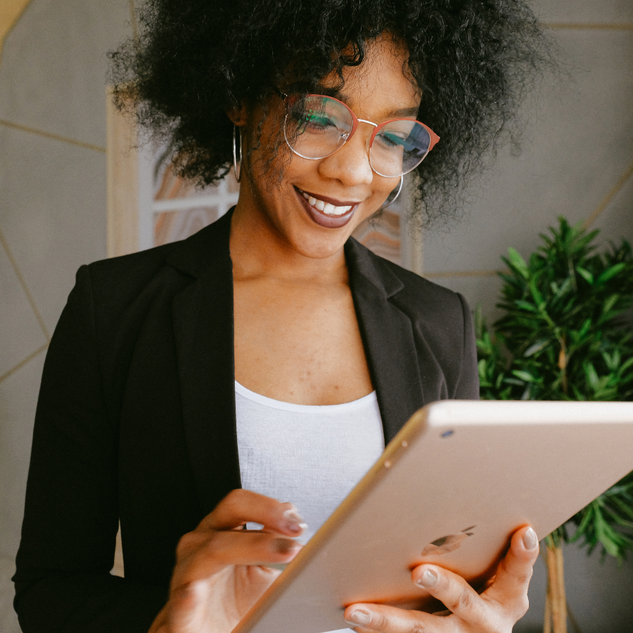 woman holding iPad